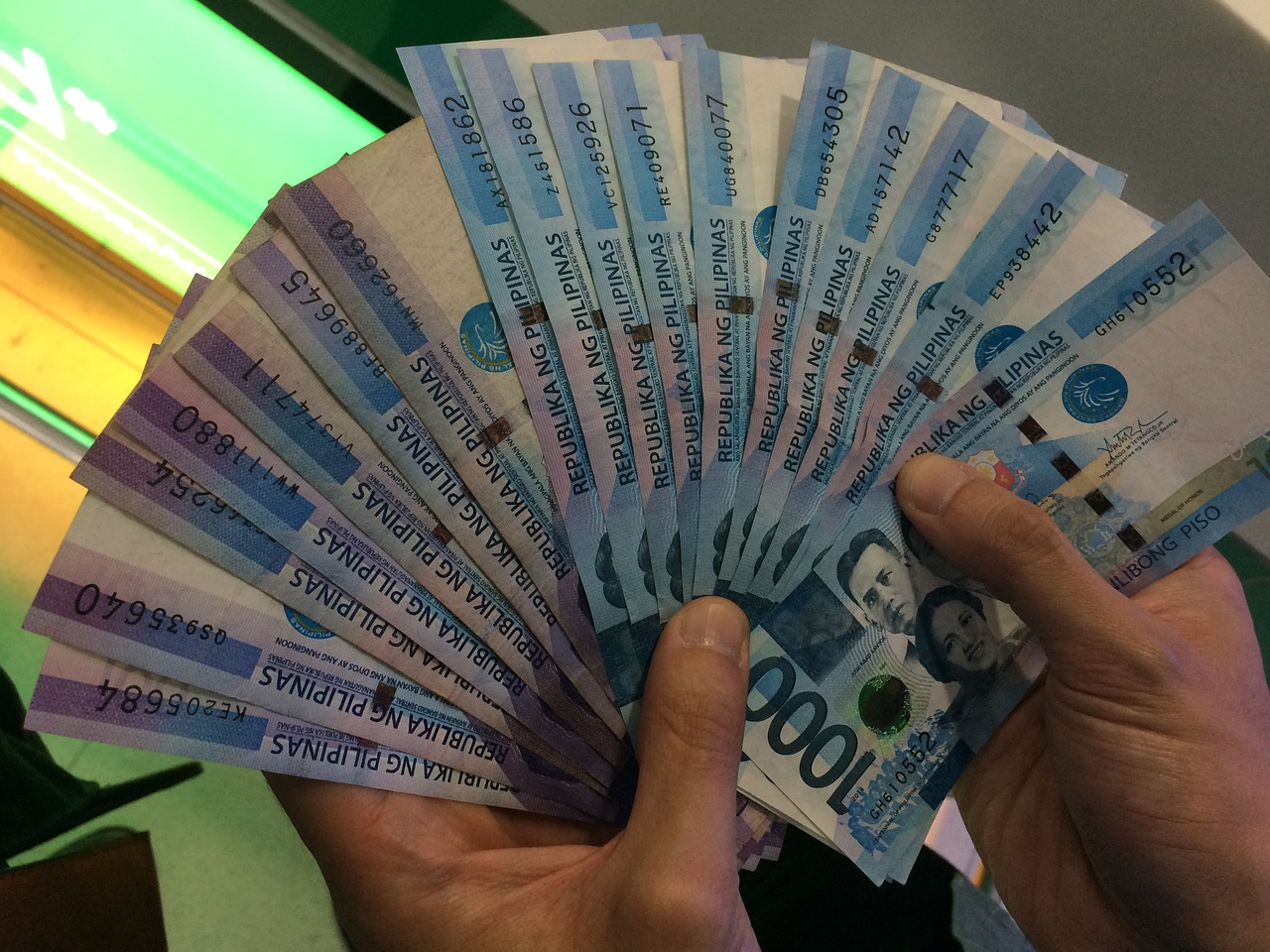 man counting money